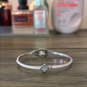 Elegant Silver Bracelet with Clover Design